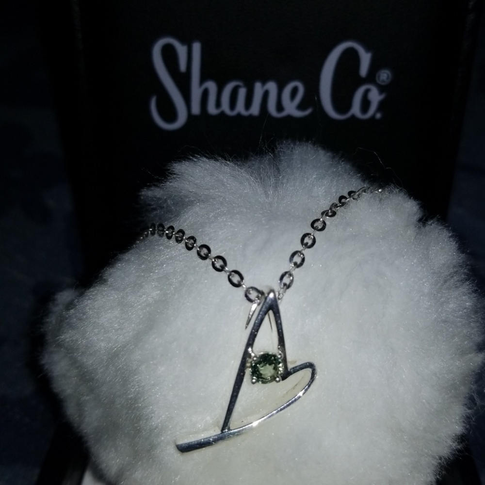 Heart necklace with light green diamond